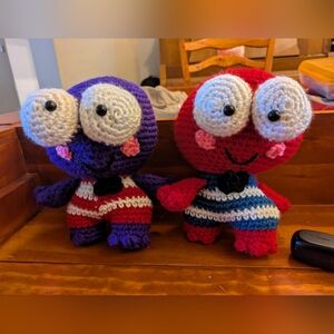 Handcrafted Red and Purple Crochet Dolls